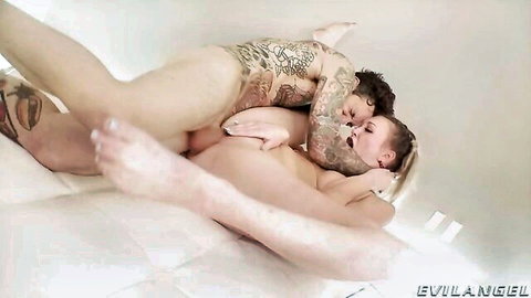 Tattooed skinny brunette with small tits fucked roughly doggy style by bearded guy