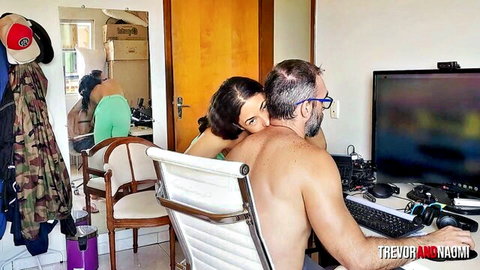 Fit brunette babe hugs muscular shirtless guy after gym at home