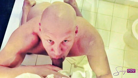Bald muscular sissy on bathroom floor sucking thick cock in intense Sissy POV blowjob