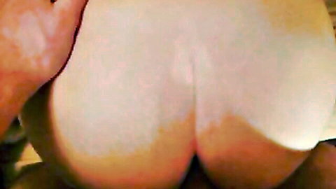 Close-up of big white ass during anal sex with cum on cheeks