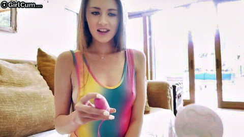 Skinny teen Kyler Quinn masturbates with toy on sofa, spreading legs