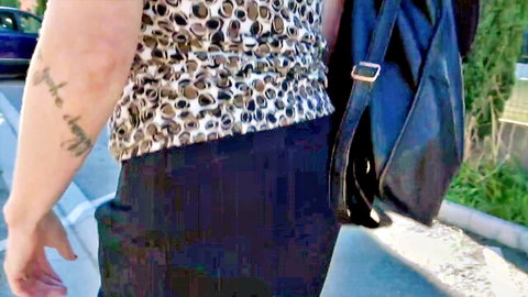 Wendy 40yo French MILF walking in zebra print top and black pants, tattooed arm