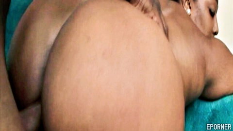 Ebony BBW spreads massive black ass cheeks wide nude on teal couch