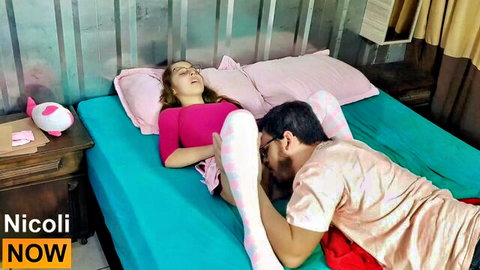 Nicoli Now as babysitter with legs up in striped socks during oral sex