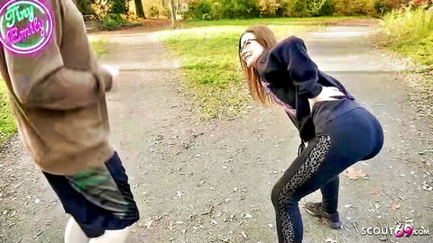 Petite brunette teen with glasses bends over in tight leopard leggings teasing ass in park