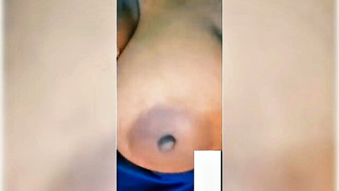 Young South Asian babe's huge brown tits with puffy erect nipple in close-up