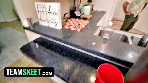 Numi Zarah teasing seductively in kitchen for TeamSkeet series
