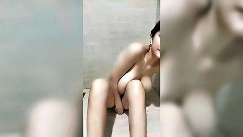 Nude Asian BBW with big tits sits spreading thick thighs in steamy bathroom teasing pussy