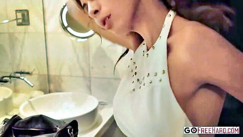 Heather Vahn in sexy white halter dress, seductive bathroom pose