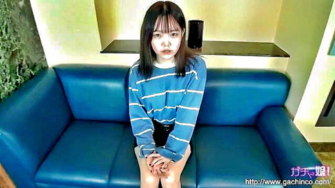 Ran chan cute Japanese teen in striped sweater and miniskirt sitting pose