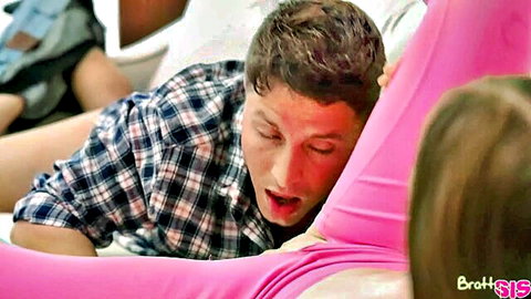 Stepsister in pink leggings teases stepbro with thigh kiss close-up