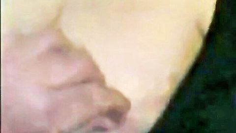 Blurry closeup of mature MILF's pale wet pussy lips in solo fingering