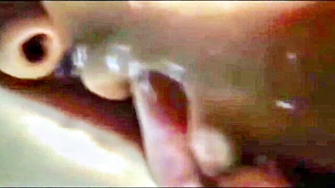 Close-up of 18yo Korean teen's tight pink shaved pussy with white cream