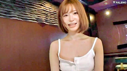 Smiling Japanese woman in revealing white tank top, JAV teaser