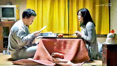 Asian housewife and man in cozy home chat, leading to intimate encounter