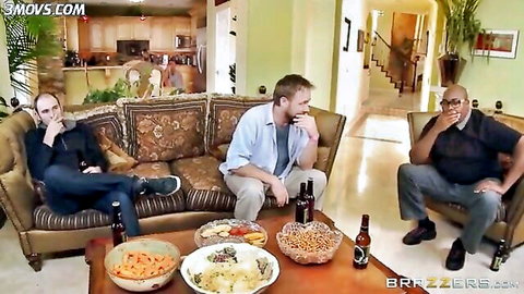 Payton West sits with husband and friend on couch, oblivious cuckold tease