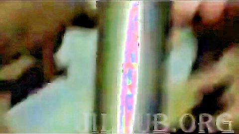 Blurry close-up of intense anal penetration with lubrication glow