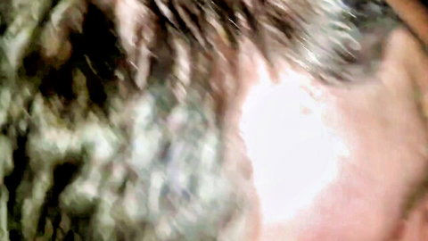 Close-up of woman in Harley cosplay sucking dick, messy hair and open mouth