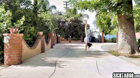Skinny brunette teen handstands outdoors flipping white dress exposing shaved pussy and small ass