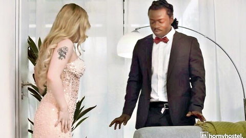 Blonde tattooed babe in sparkly pink dress faces suited black stud with dreads in hotel room