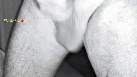 Close-up of meaty male testicles in solo adult video