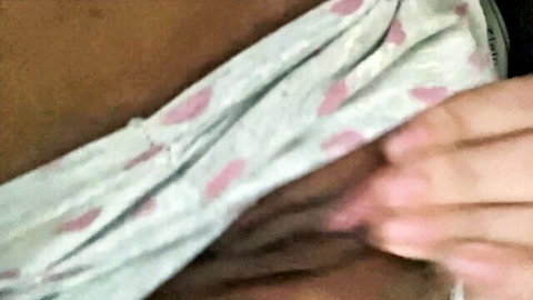 Close-up solo female masturbation in pink spotted lingerie