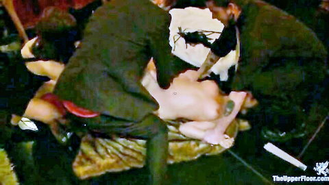 Nude woman in kinky orgy gets milked by suited figures in wild group scene