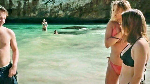 Sophia Munster and Carlotta Weide in skimpy bikinis on sunny beach, nude tits celeb scene