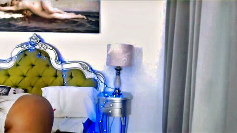 Evaclover nude lying on luxurious green bed sheets
