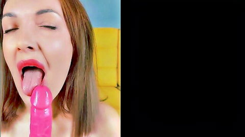Redhead babe extends tongue to lick glossy pink dildo closeup