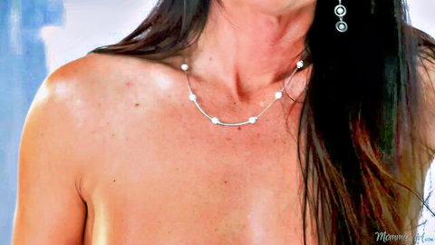 India Summer topless with pearl necklace, long dark hair