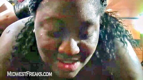 Sweaty black BBW milf smiling close-up in amateur group sex