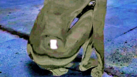 Nude woman in doggy pose, grey body paint, from The Wrong Terminator amateur film