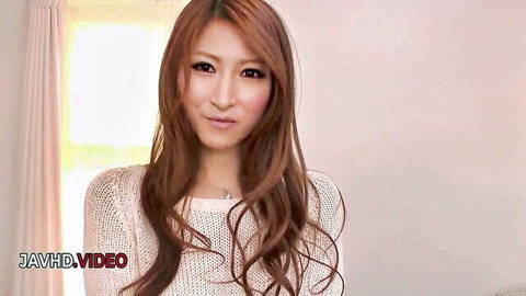 Reira Aisaki smiling in cozy sweater for JAV deep-throat video