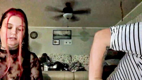 Redhead with big tits visible through sheer mesh top touched by boyfriend's hand in webcam bedroom