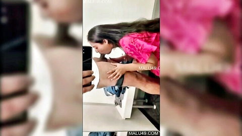 Cute Tamil woman in pink top teases bare midriff and intimate pose