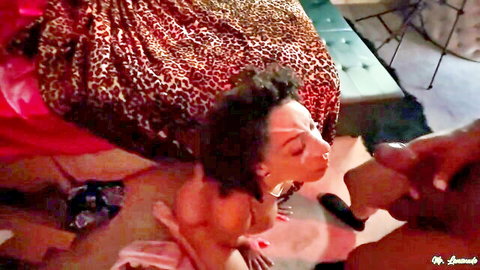 Curly haired brunette with big tits puckers lips on massive black cock for blowjob