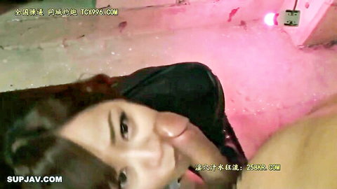 Asian babe with bangs tongue out licking thick cock in intense blowjob closeup