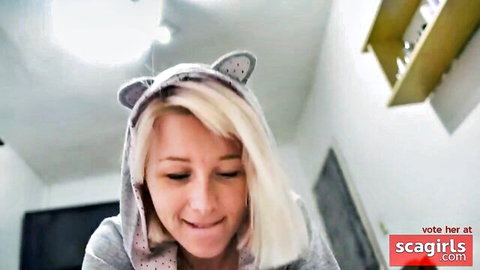 Blonde babe in cat ear hoodie smiling seductively