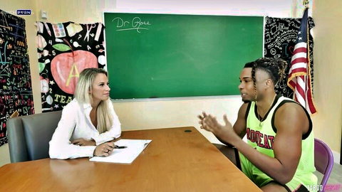 Sadie Rose as blonde teacher interviews muscular BBC athlete in class
