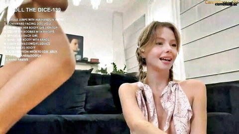 Elli Harmon and Wanda Robinson jumping playfully in halter tops cam show