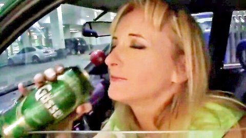Karlee Grey blonde MILF drinking beer in car, seductive exhale