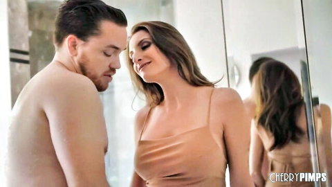 Silvia Saige in sexy peach dress, intimate embrace with shirtless stud