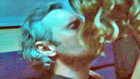 Blonde babe passionately kissing handsome man in closeup embrace