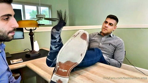 Bearded man worships manager's socked feet in office fetish scene