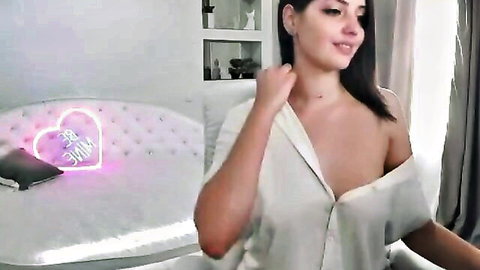 LollyGirll teasing in open white shirt with cleavage on Cam4