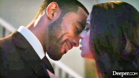 Abigail Mac shares intimate nuzzle with suited man in close-up