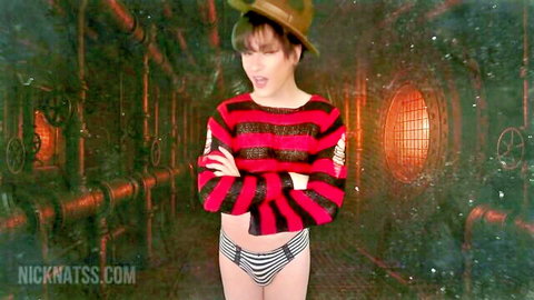 Femboy in striped sweater and panties posing in fantasy demon nightmare scene