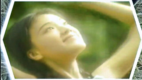 Shu Qi smiling sensually outdoors in Taiwanese softcore
