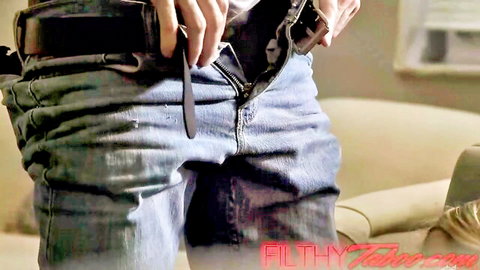 Man in unzipped jeans holding knife in rough taboo sex scene